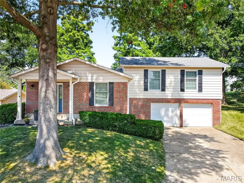Multi Level Home with Brick and Vinyl Siding — 16 Mill Race Drive, St Peters, MO 63376