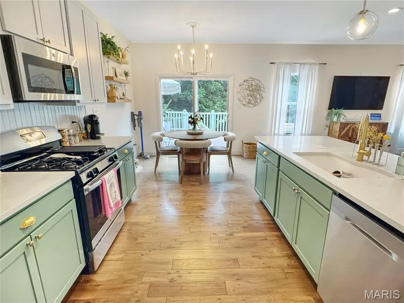 Wood-finish flooring throughout the space — 4024 Glengarry Drive, Wentzville, MO 63385