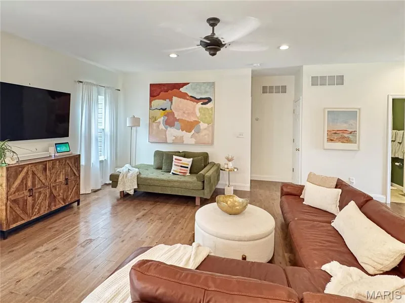 Recessed lighting, wood-finish flooring, ceiling fan, and white baseboards — 4024 Glengarry Drive, Wentzville, MO 63385
