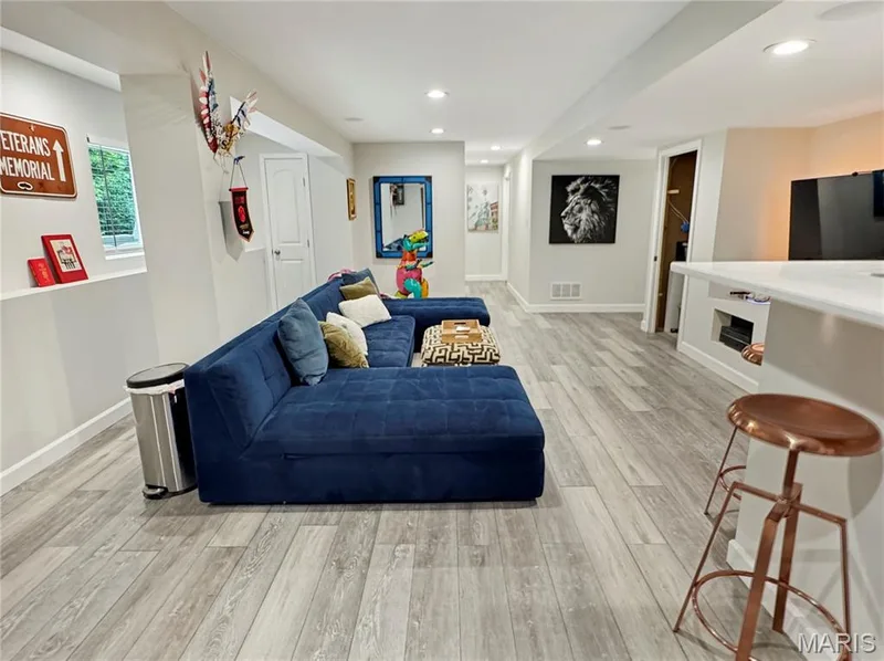 Recessed lighting, LVP flooring, and white trim — 4024 Glengarry Drive, Wentzville, MO 63385