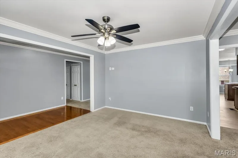 Hardwood flooring in the front entry. Formal living and dining room to the right of entry. — 1346 Cherry Glen Court, Chesterfield, MO 63017