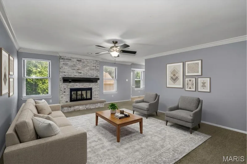 Virtually staged family room with gas fireplace, ceiling fan. — 1346 Cherry Glen Court, Chesterfield, MO 63017