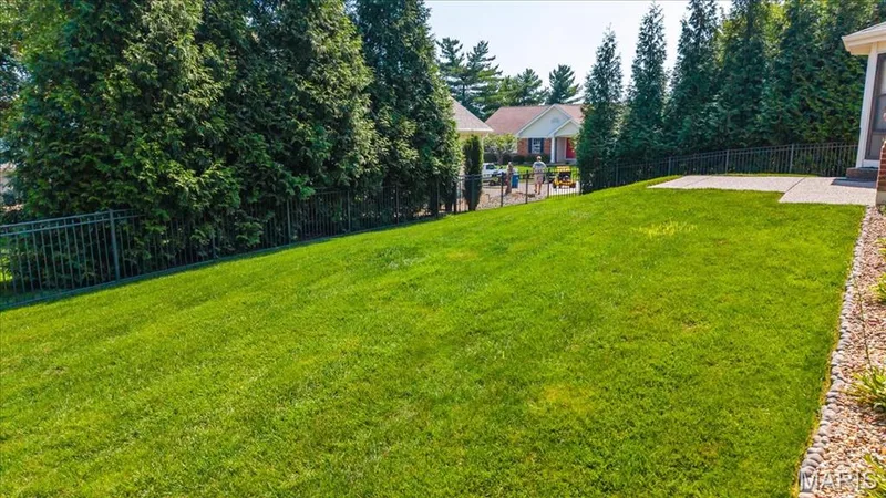 The fenced and private backyard is perfect for family get togethers or for kids and pets. — 1346 Cherry Glen Court, Chesterfield, MO 63017