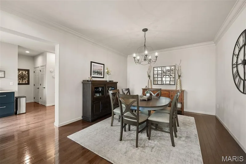 Hardwood flooring, crown molding, and an open entryway — 2700 Grover Crossing Drive, Wildwood, MO 63040
