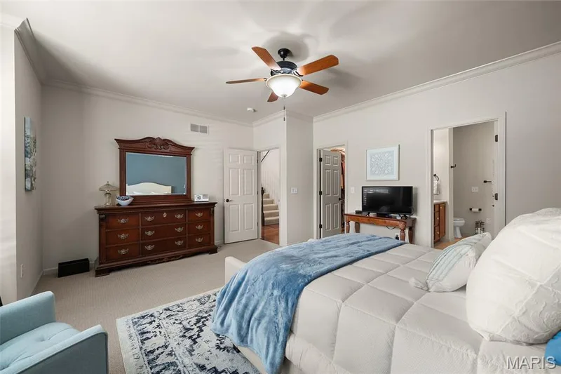 Recessed lighting, crown molding, ceiling fan, carpeted flooring, and a walk-in closet — 2700 Grover Crossing Drive, Wildwood, MO 63040