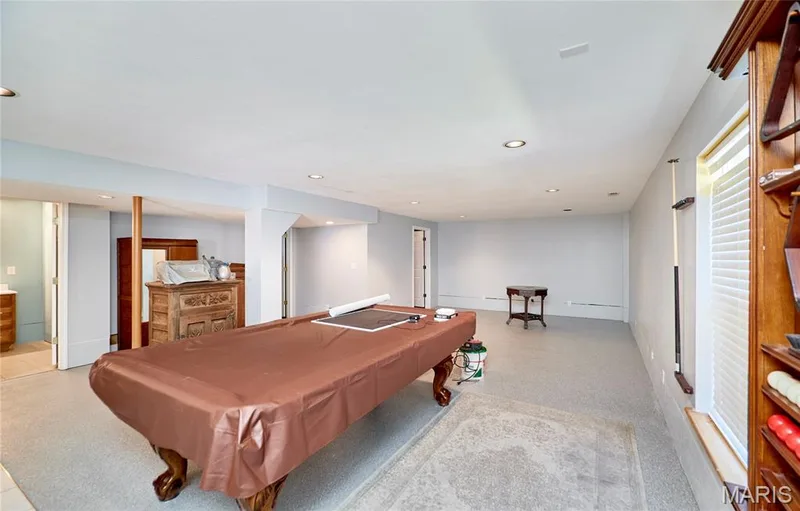 Recessed lighting, wood-finish shelving, and light-colored walls — 3641 Wind Chime Lane, St Charles, MO 63301