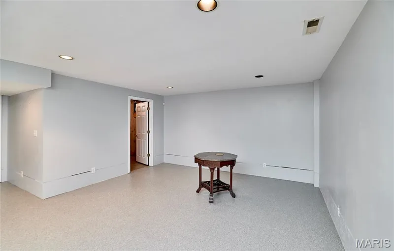 Recessed lighting throughout, light gray wall finishes, and light-colored flooring — 3641 Wind Chime Lane, St Charles, MO 63301
