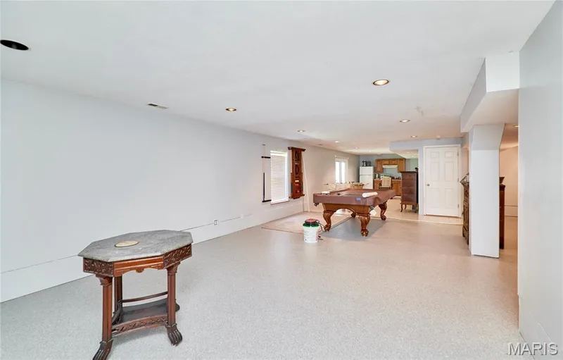 Expansive floor plan with recessed lighting and light-toned flooring — 3641 Wind Chime Lane, St Charles, MO 63301