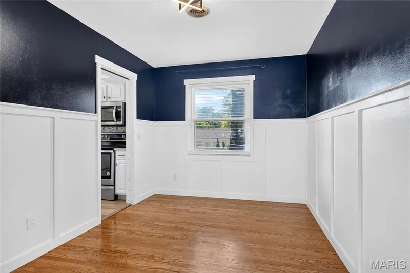 Dinin room with wainscot — 120 S Duchesne Drive, St Charles, MO 63301