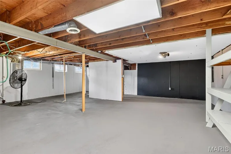 View of basement with storage shelves — 120 S Duchesne Drive, St Charles, MO 63301