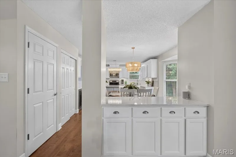 Open view into the kitchen from the family room! — 7159 Heartland Drive, Dardenne Prairie, MO 63368