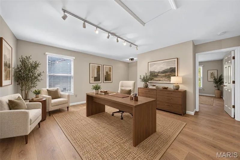 Wood-finish flooring, neutral wall tones, recessed lighting, and a window with blinds — 155 Snake River Drive, Dardenne Prairie, MO 63368