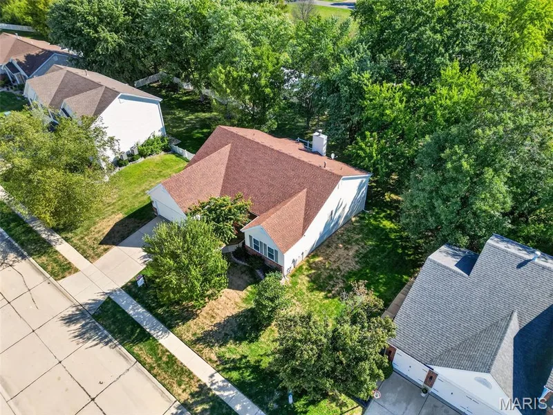 Single-story residence with a pitched roof and a light-colored exterior — 155 Snake River Drive, Dardenne Prairie, MO 63368