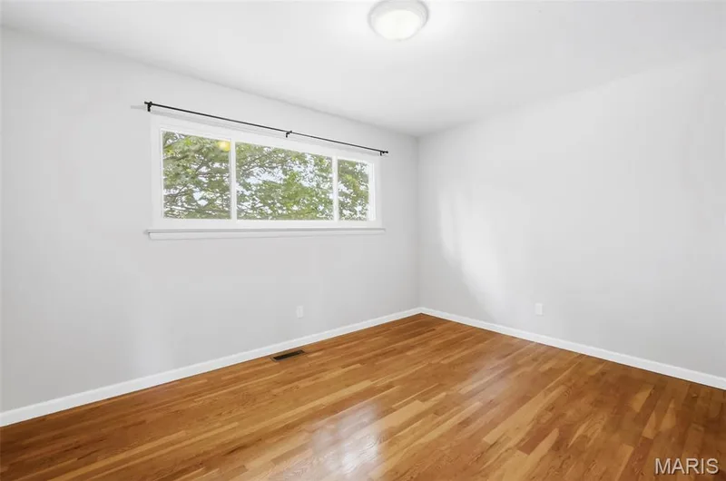 Primary Bedroom with Hardwood Flooring — 3361 Clemens Court, St Charles, MO 63301