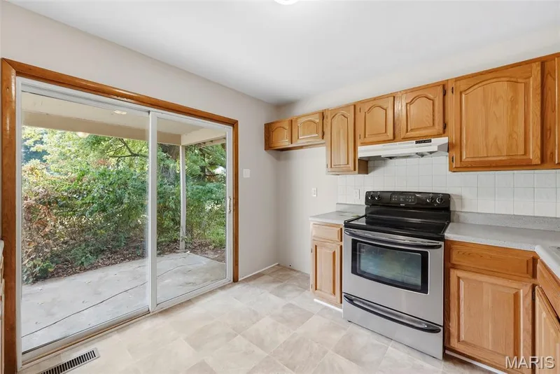 Kitchen with Sliding Door to the Carport — 3361 Clemens Court, St Charles, MO 63301