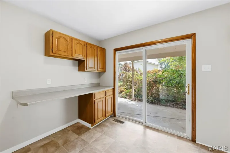 Kitchen with Sliding Door to the Carport — 3361 Clemens Court, St Charles, MO 63301
