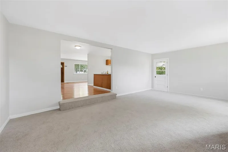 Step Down Family Room (The door shown is inoperable) — 3361 Clemens Court, St Charles, MO 63301