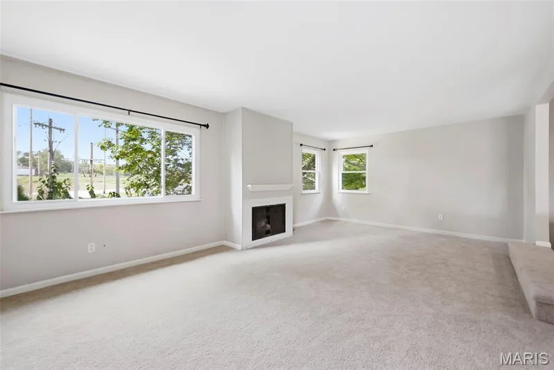 Step Down Family Room (Fireplace is inoperable) — 3361 Clemens Court, St Charles, MO 63301