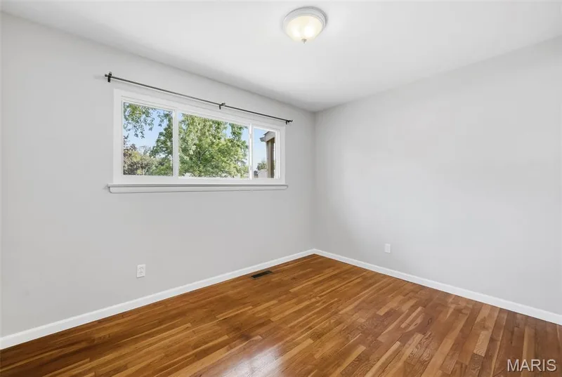 Secondary Bedroom with Hardwood Flooring — 3361 Clemens Court, St Charles, MO 63301