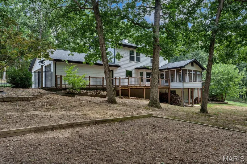 This home sits on just over 3 acres and has a section fenced - perfect for those with or wanting pets. — 2 Patrick Lane, Defiance, MO 63341