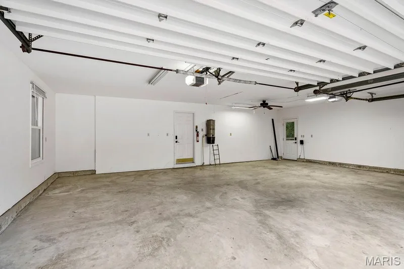 Space to park 3 vehicles with easy access to the home! There is also a utility door to the deck at the back of the home. — 2 Patrick Lane, Defiance, MO 63341