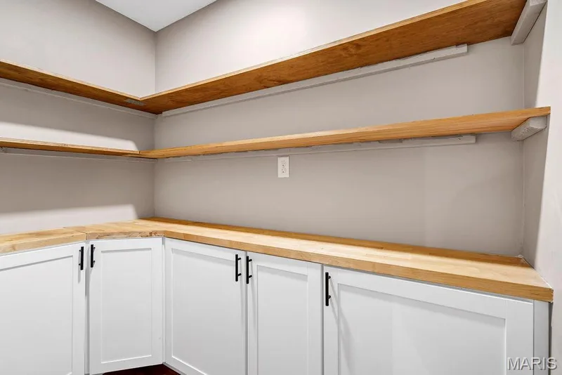 Love this pantry - cabinets, shelving & electric! — 2 Patrick Lane, Defiance, MO 63341
