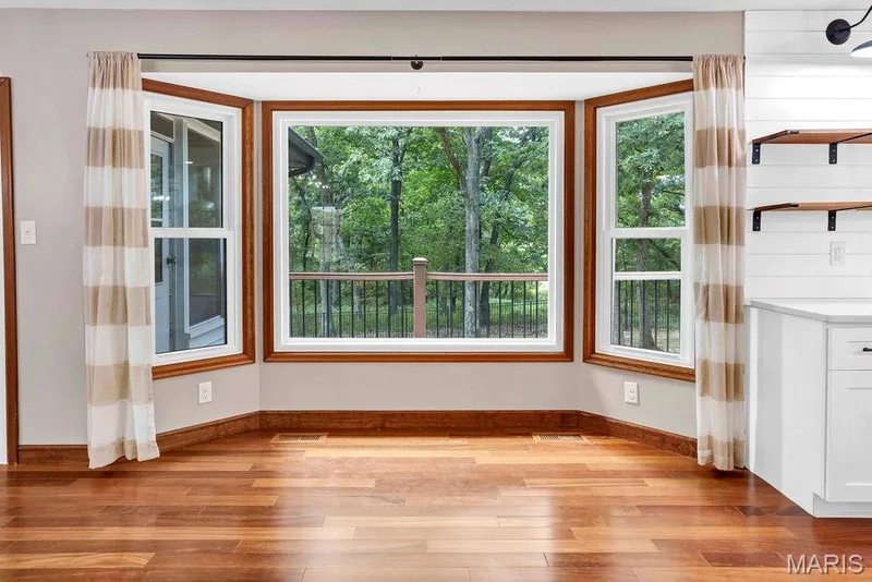This would make THE perfect spot for 2 comfy swivel chairs! — 2 Patrick Lane, Defiance, MO 63341