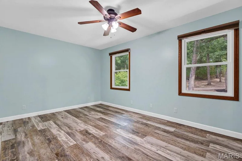 Bedroom 2: has a walk-in closet that contains the HVAC system for the upper level. Yes - it is zoned! So nice for a home this size. — 2 Patrick Lane, Defiance, MO 63341