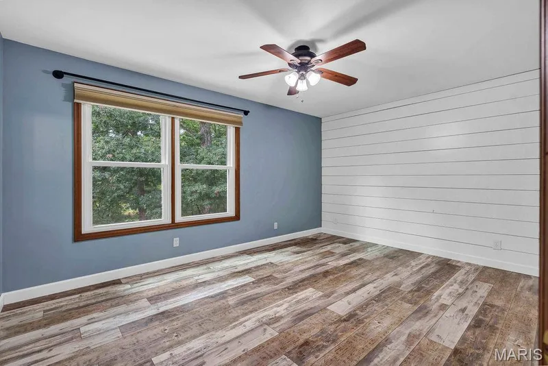 Bedroom 3 offers a shiplap wall detail. — 2 Patrick Lane, Defiance, MO 63341
