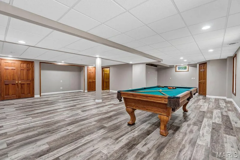There are wall speakers and two large closets flanking a spot begging for a TV! This will be THE spot for binging your favorite shows. — 2 Patrick Lane, Defiance, MO 63341