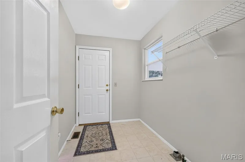 Laundry/mud room between garage and kitchen — 7235 Picasso Drive, Dardenne Prairie, MO 63368