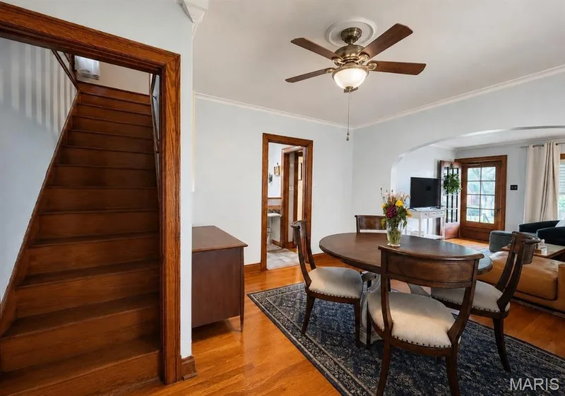 Dining area and the staircase that leads upstairs — 1029 Jackson Street, St Charles, MO 63301