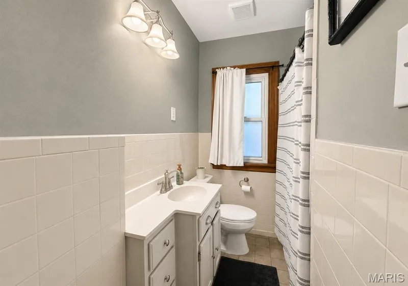 Virtually photographed to look like bathroom after bathroom is painted — 1029 Jackson Street, St Charles, MO 63301
