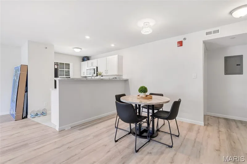 Dining area offers plenty of space and opens nicely to the kitchen. — 4101 Spring Creek Lane, O'Fallon, MO 63368