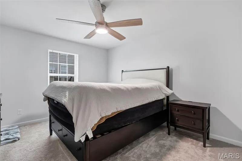 Spacious primary bedroom suite with brand new carpeting. — 4101 Spring Creek Lane, O'Fallon, MO 63368