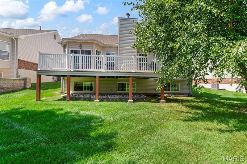 Amazing composite Deck w/Vinyl Railings.  Low maintenance and posts set in concrete piers for long-term durability. — 18 Eagle Bluff Lane, St Charles, MO 63303