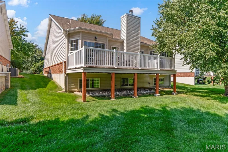 Lush Lawn is fully irrigated with Sprinkler System.  Lawn Care is included in monthly fee ~ just enjoy the view — 18 Eagle Bluff Lane, St Charles, MO 63303