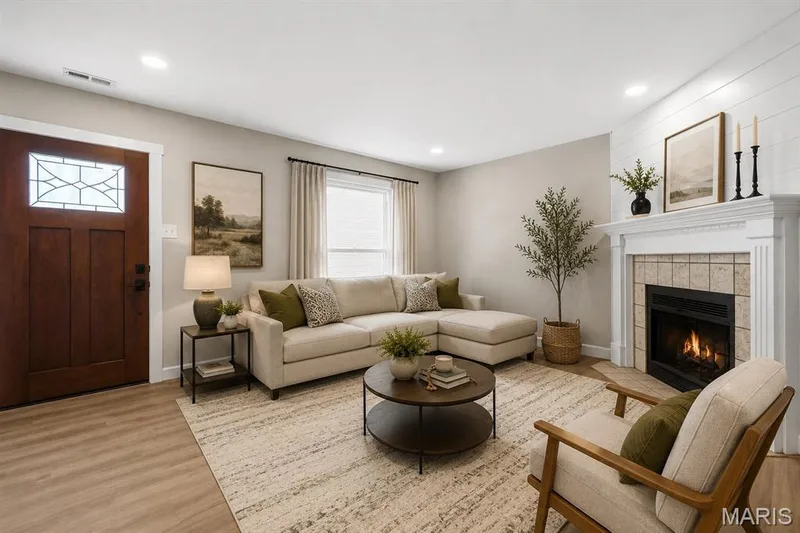 Living room virtually  staged — 39 Park Charles Boulevard S #D, St Peters, MO 63376