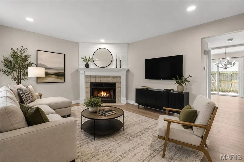 living room virtually staged view 3 — 39 Park Charles Boulevard S #D, St Peters, MO 63376