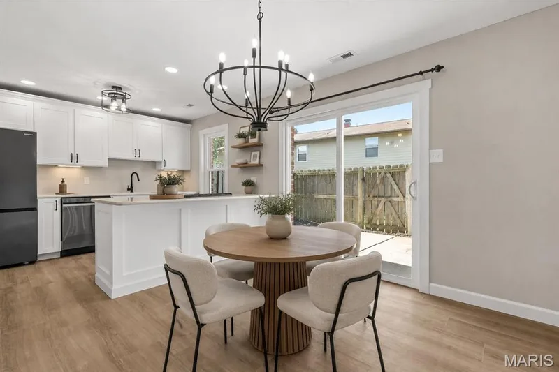 View 2 of breakfast room/bar virtually staged — 39 Park Charles Boulevard S #D, St Peters, MO 63376