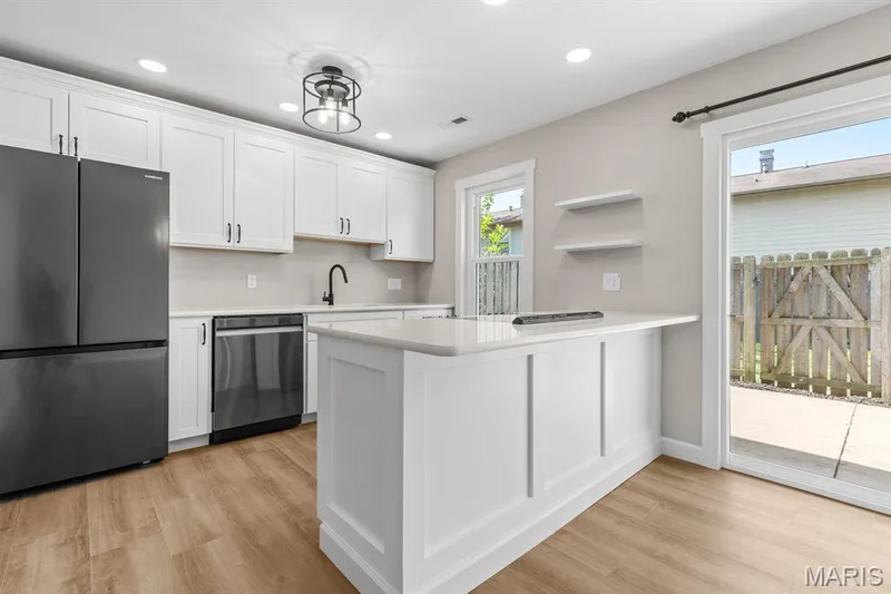 Convenient breakfast bar and brand new stainless refrigerator! — 39 Park Charles Boulevard S #D, St Peters, MO 63376