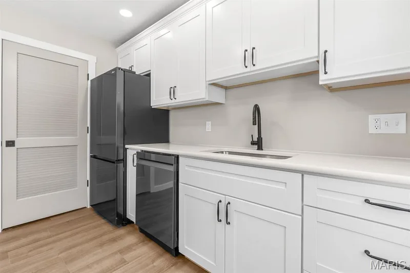The main floor laundry & new HVAC system is located just off the kitchen — 39 Park Charles Boulevard S #D, St Peters, MO 63376