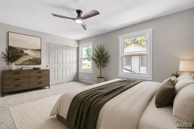 Primary bedroom virtually staged — 39 Park Charles Boulevard S #D, St Peters, MO 63376