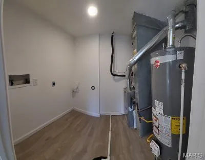 Main level laundry/mechanical room featuring a brand new furnace & water heater. The air conditioner is new too! — 39 Park Charles Boulevard S #D, St Peters, MO 63376