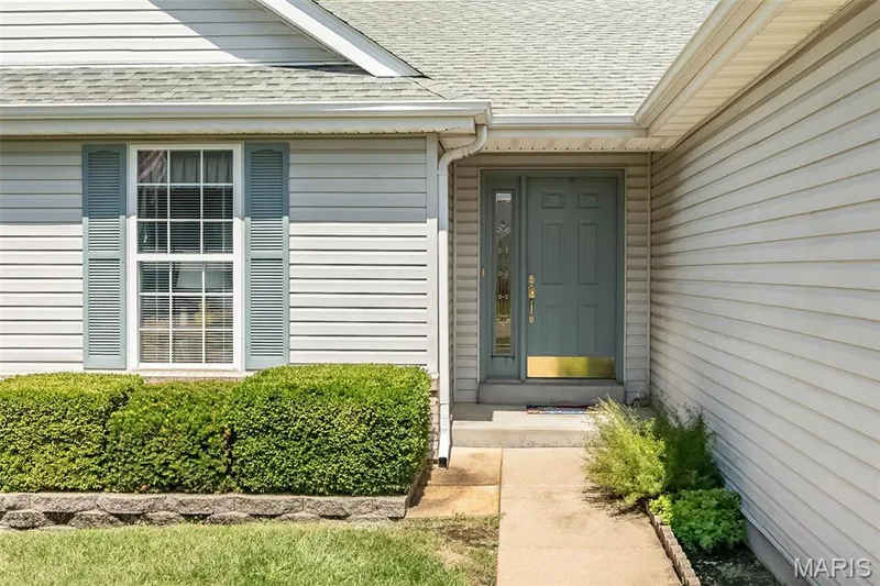 Brick and vinyl low maintenance exterior — 17027 Old Hollow Drive, Wildwood, MO 63040