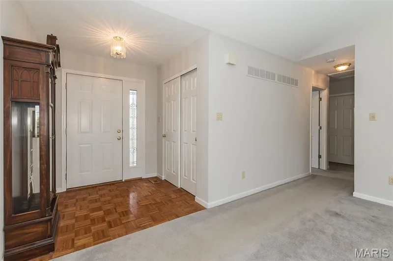 Foyer with guest closet — 17027 Old Hollow Drive, Wildwood, MO 63040