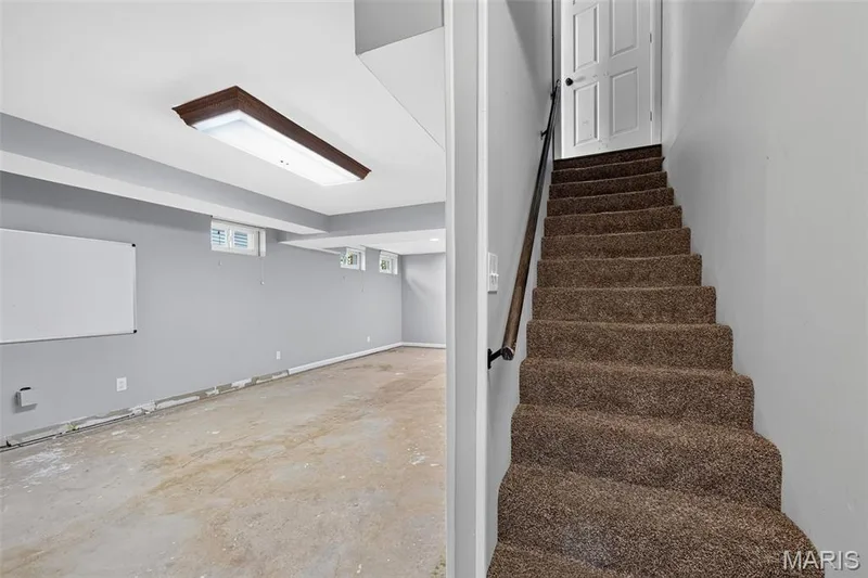 BASEMENT W/ MISSING CARPET — 170 Autumn Chase Drive, O'Fallon, MO 63366
