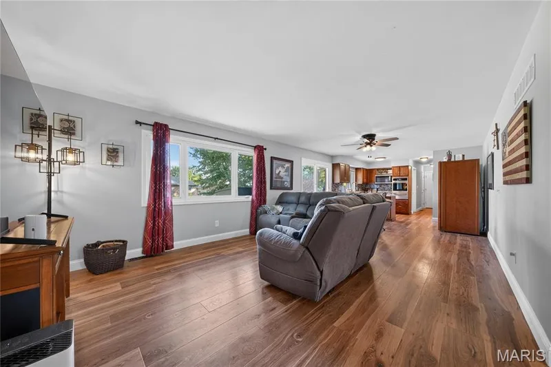 Great room with hardwood floors — 72 Champagne Drive, Lake St. Louis, MO 63367