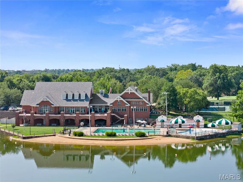 Club house with swim beach — 72 Champagne Drive, Lake St. Louis, MO 63367