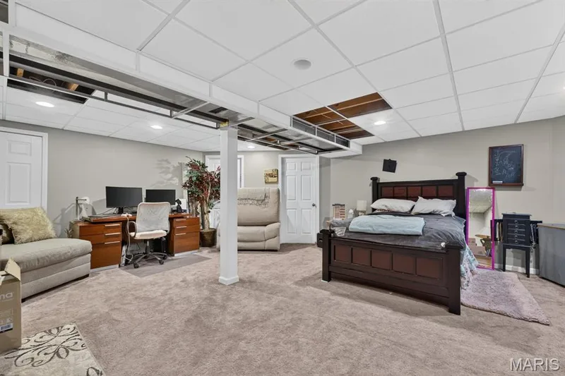 Finished basement space currently used as sleeping area. — 314 Evening Star Court, Wentzville, MO 63385